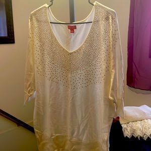 Elle cream colored sweater with sequins. Size XL no sequins missing.